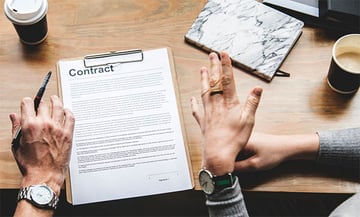 Home-buyer-signing-contract