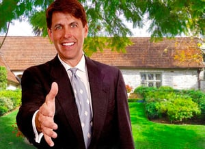 New home sales person reaching out to shake hands