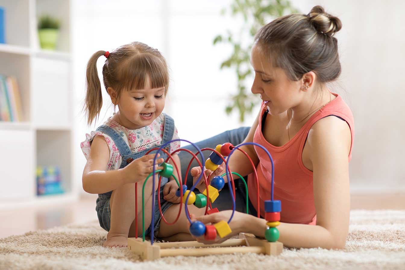 Woman-and-daughter-on-floor-in-a-new-home