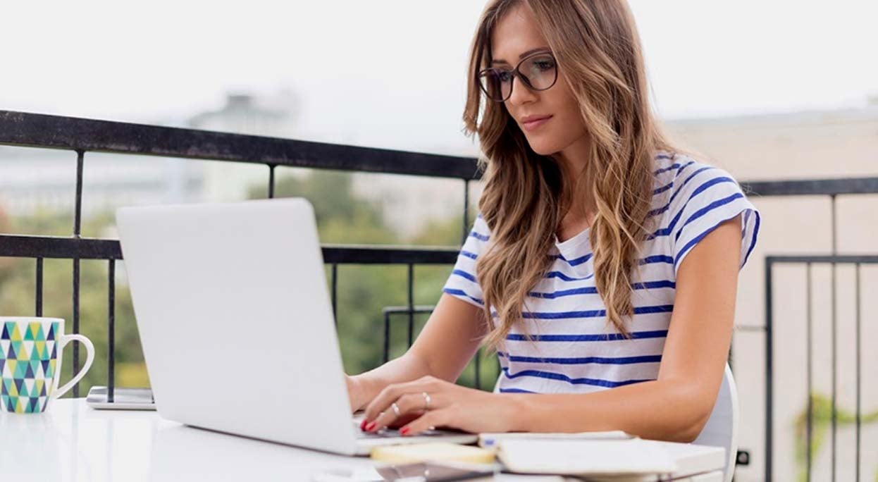 Young female using website tools to research home builders