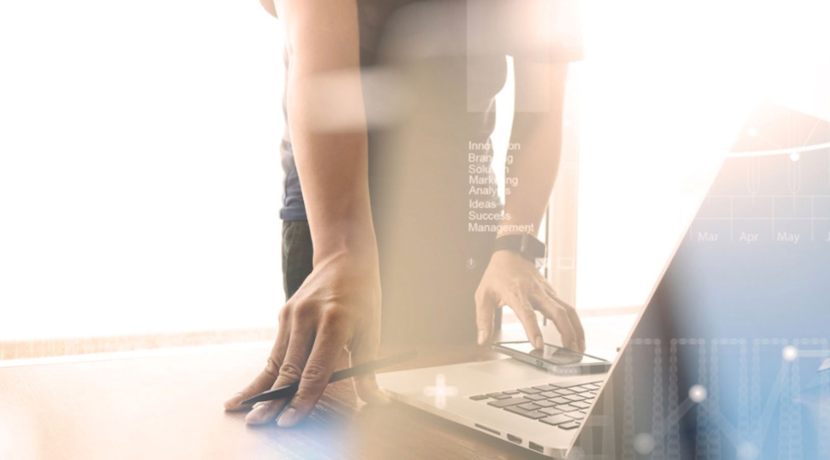 Young online sales consultant working on a computer